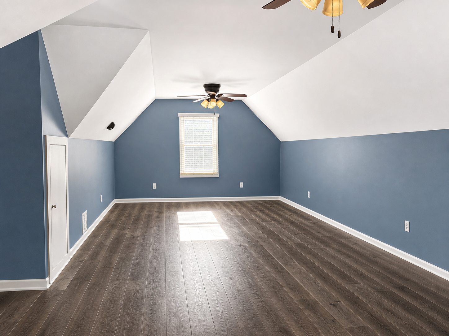 Polished bonus room photo from the opposite end of the room